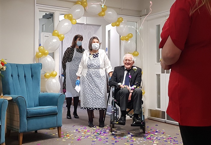 Peter and Jean celebrate with OSJCT The Cedars staff