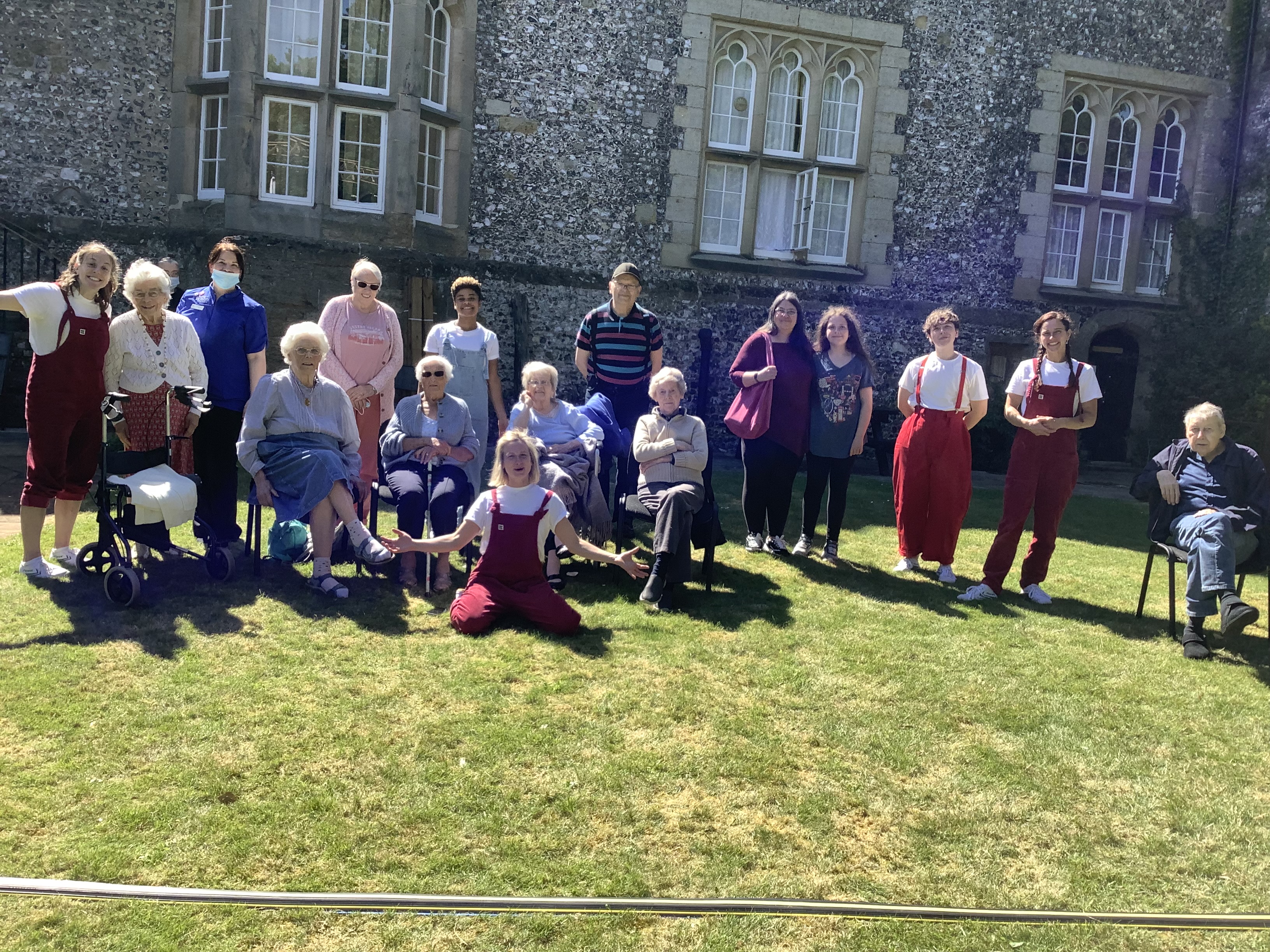 Performers from The Dot Collective with residents and staff from St Wilfrid's Priory