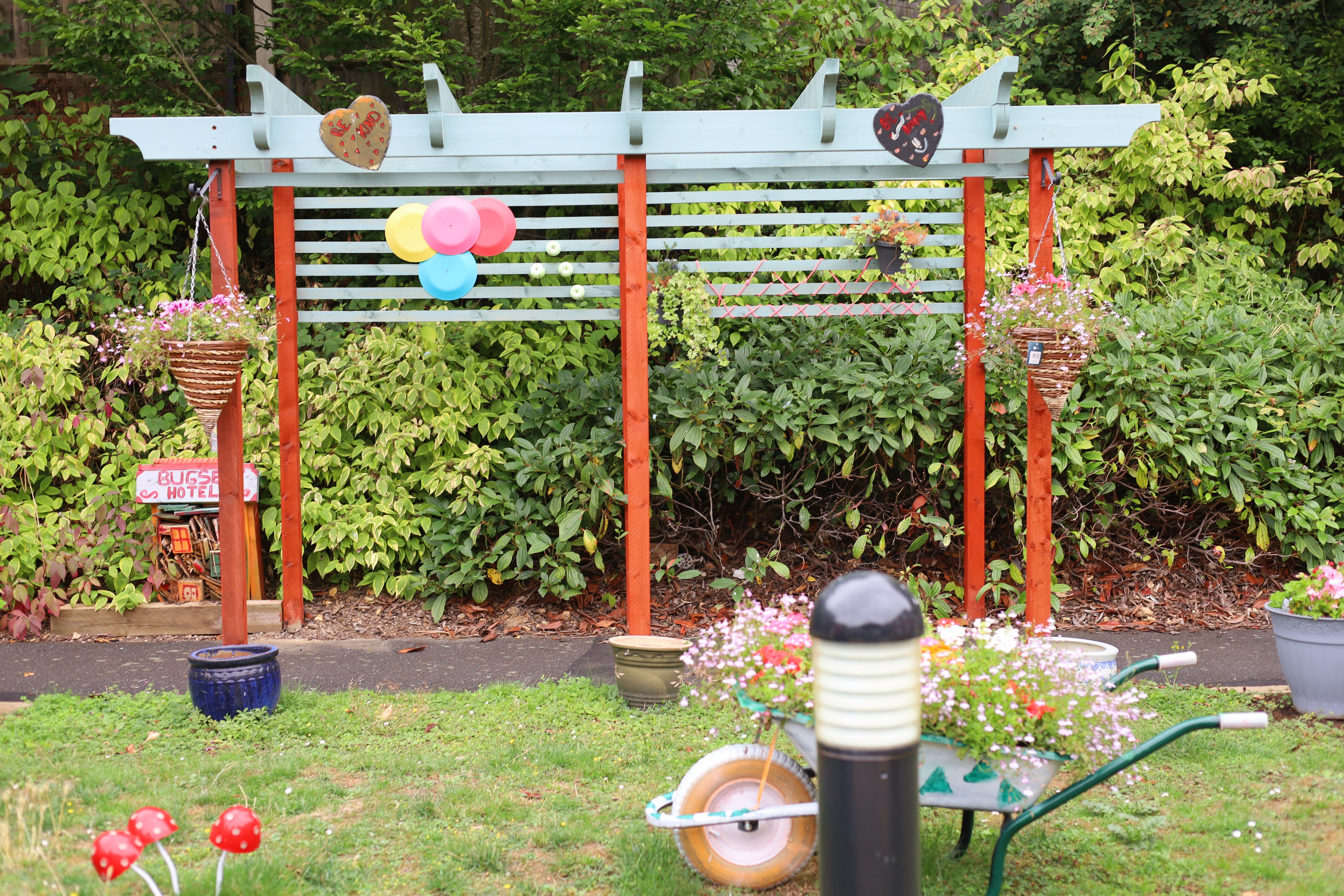 Pergola built and decorated by family members in the pretty garden.
