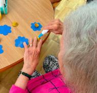 Edwardstow Court residents creating paper flowers