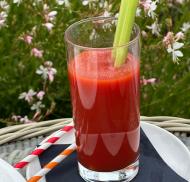 A classic tomato juice cocktail with a crisp celery garnish.