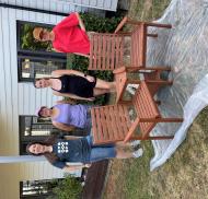 Volunteers with restored garden seating