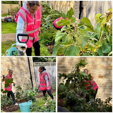 Volunteers from Network Rail clearing weeds and tidying the flower beds at Edwardstow Court