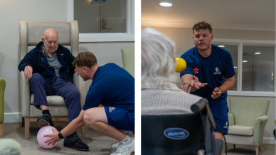 Resident joins a seated ball game led by a cricket coach.