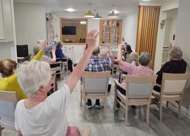 Edwardstow residents enjoying balance and mobility stretches