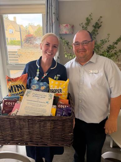 Home Manager, Matthew sharing the "Thank you Hamper" with the Community Nursing Team