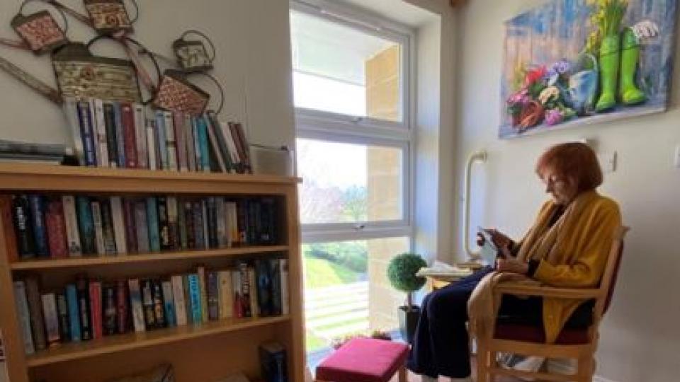 Murial  in the reading room