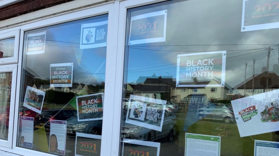 Buckland Court's window with Black History Month display