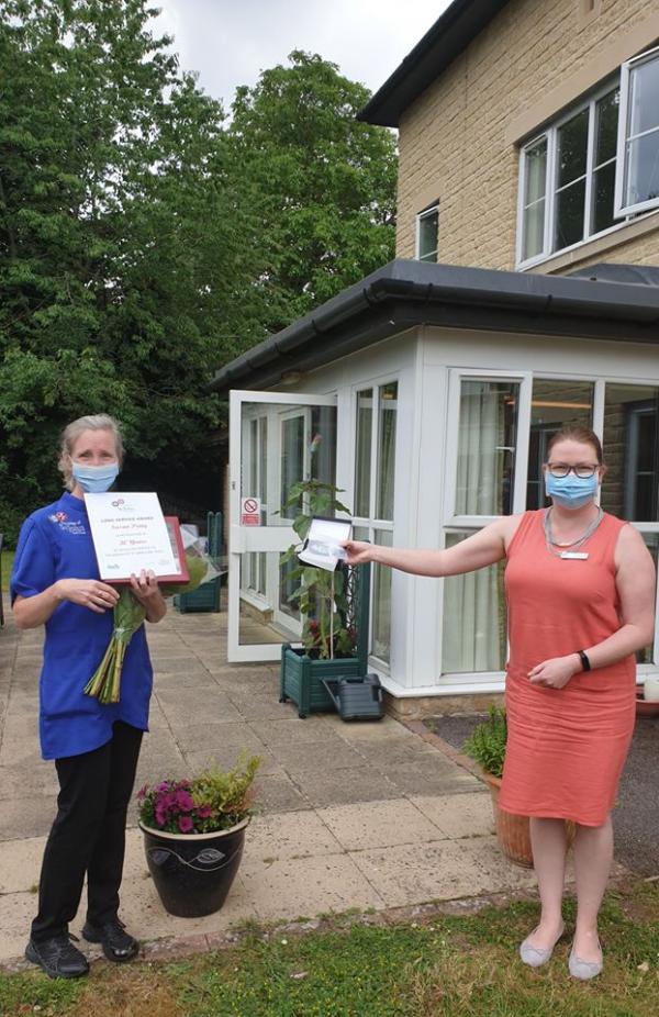 Carer receives award for 30 years' service