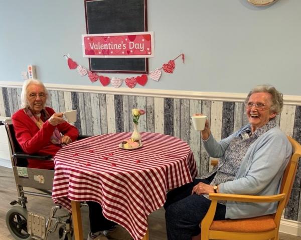 Rose welcomes Mary to the home over a cuppa
