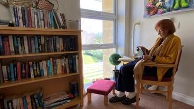 Murial  in the reading room