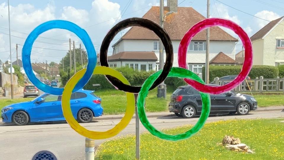 Olympic rings in the window at Buckland Court