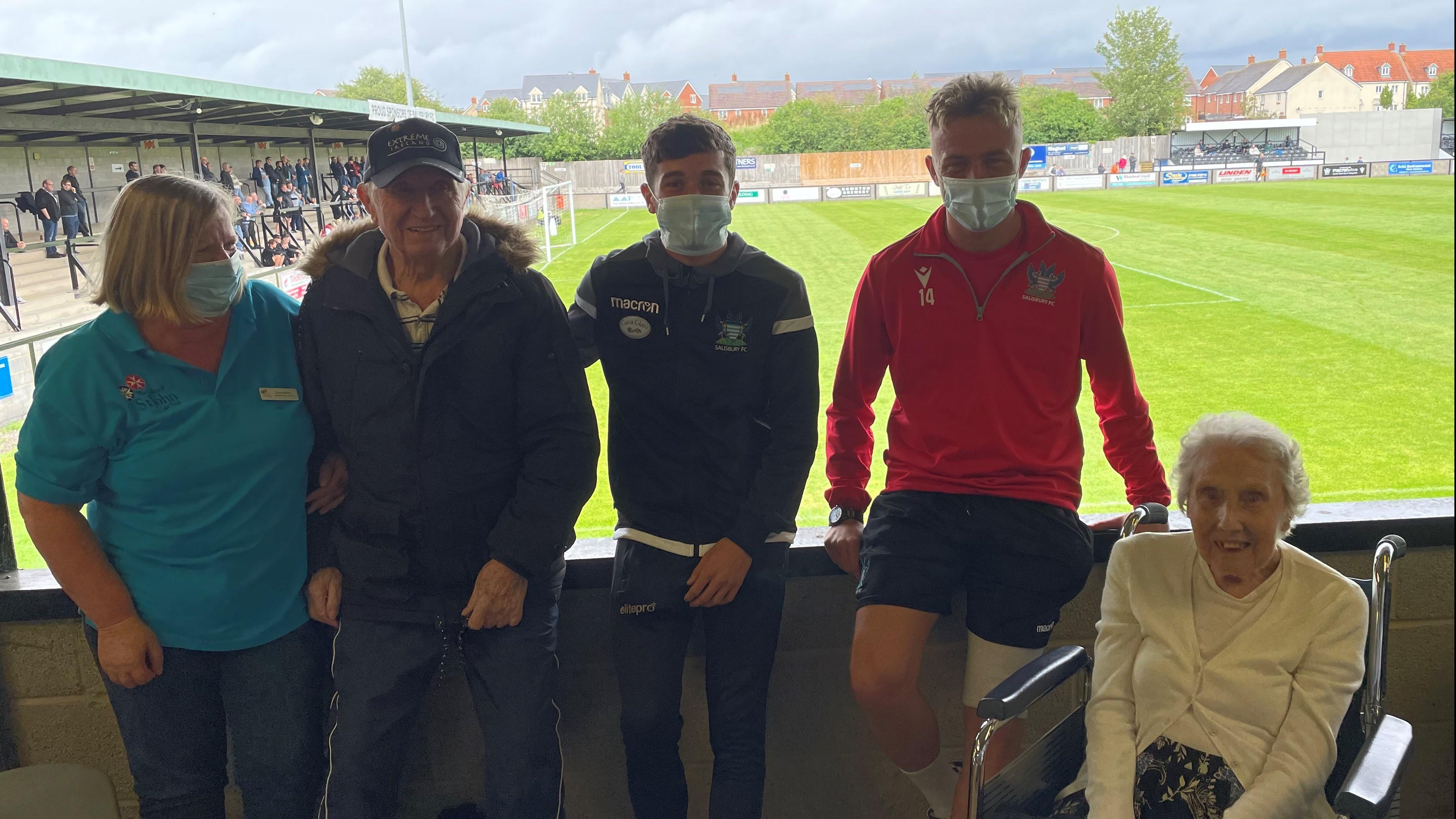 Staff and residents meet Salisbury FC players