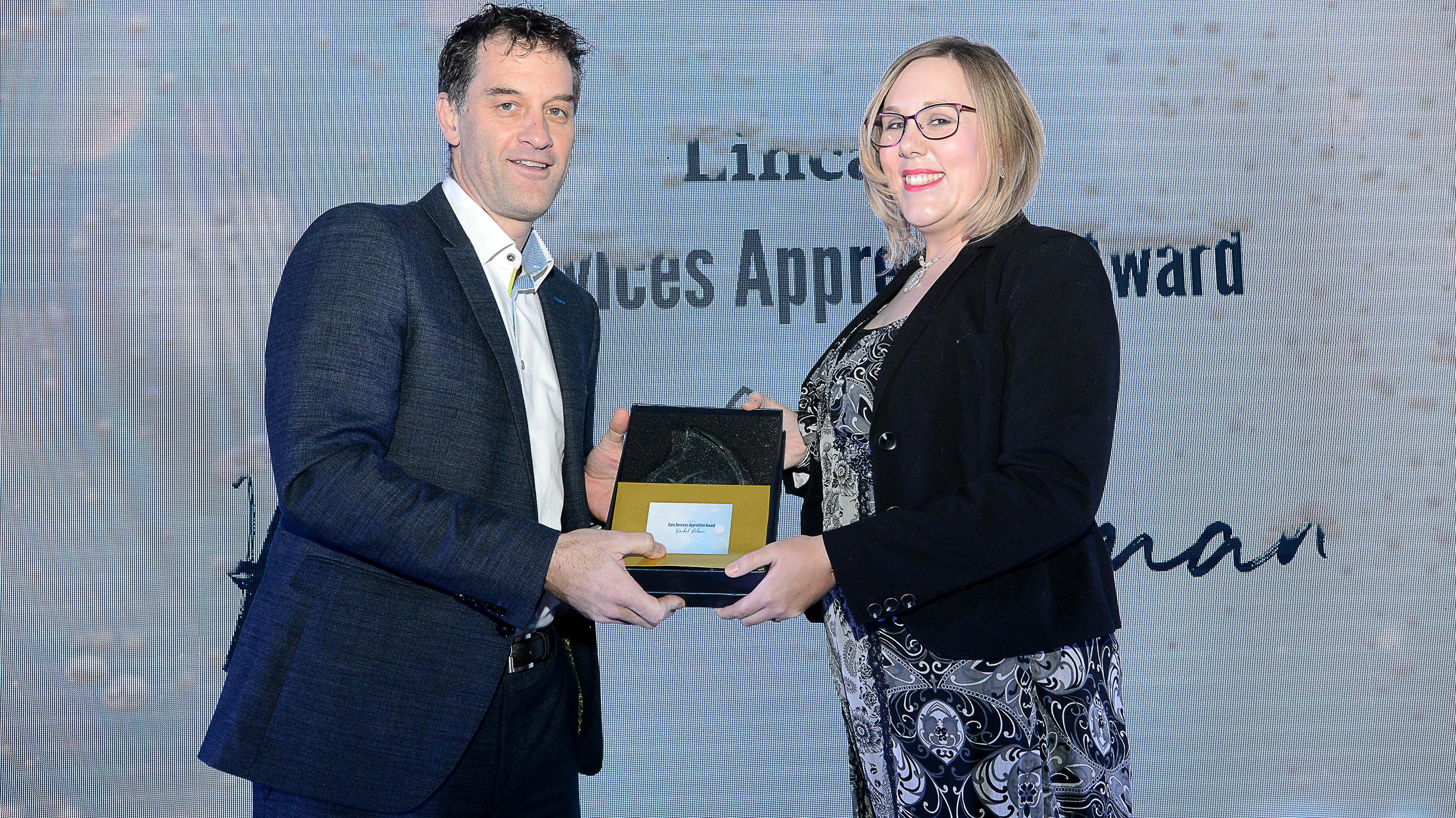 Rachel Kelman receives one of her apprenticeship awards