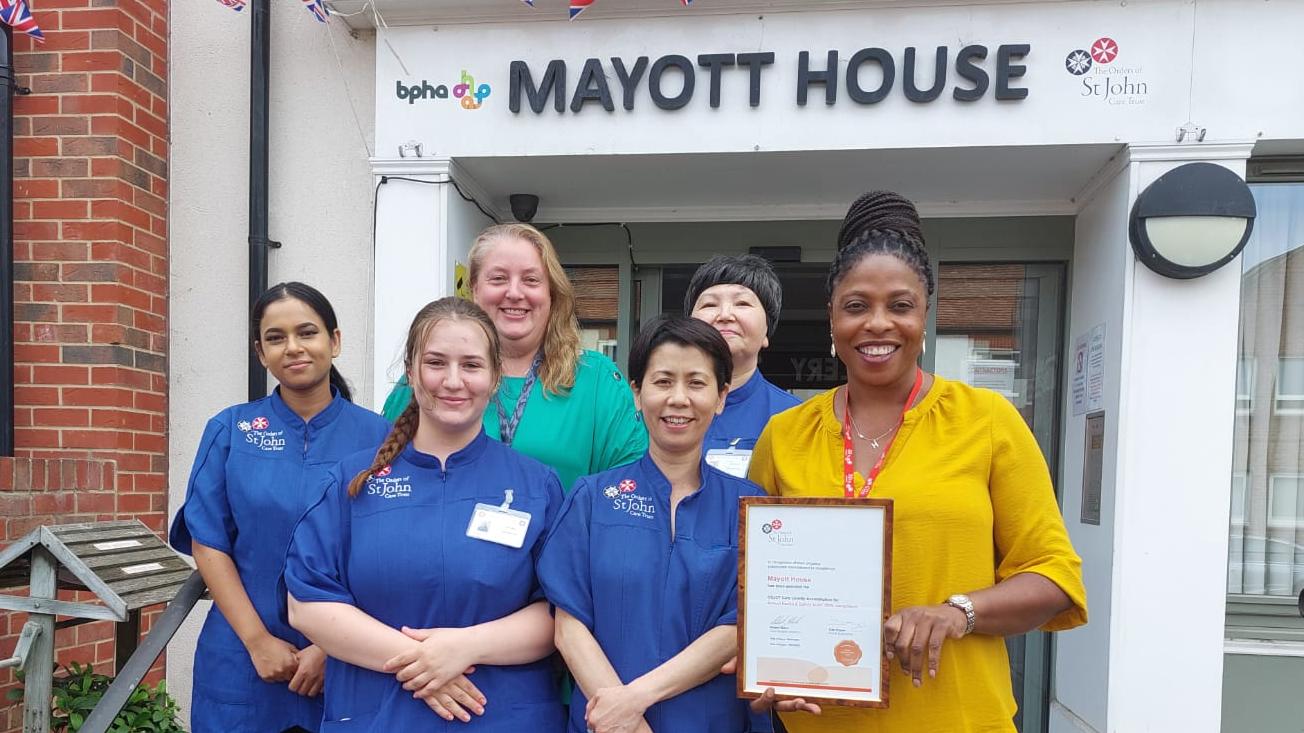 Manager Hilda with Mayott House team members