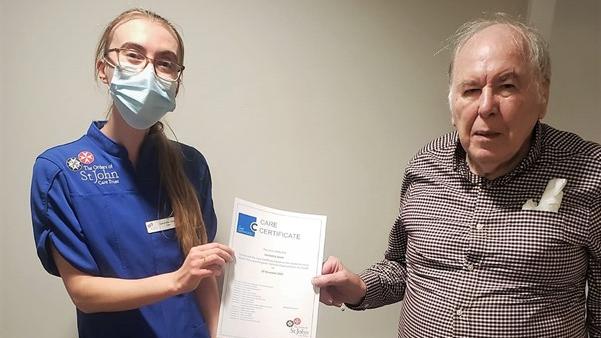 Samantha receiving her care certificate
