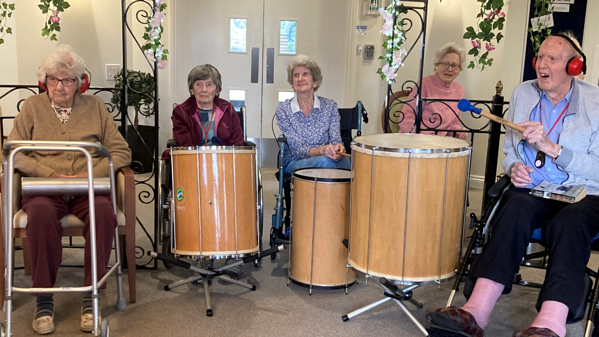 Goodson Lodge residents playing Samba drums