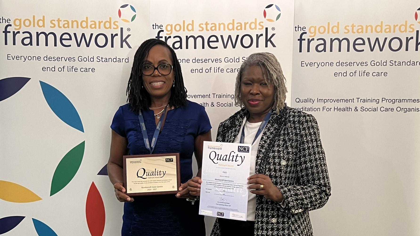 Doreen Paisly (R) collects GSF Award