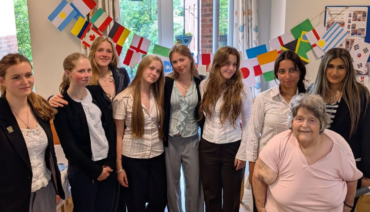 OSJCT Ashwood Care Centre welcomes Warminster school for a World Cup-themed intergenerational afternoon