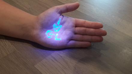 Glitterbug potion highlighted with a UV torch.