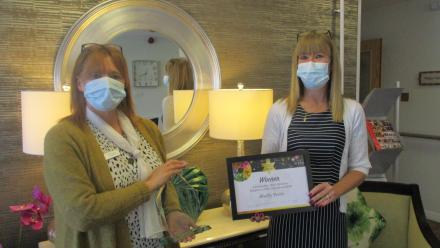 Shelly receiving award