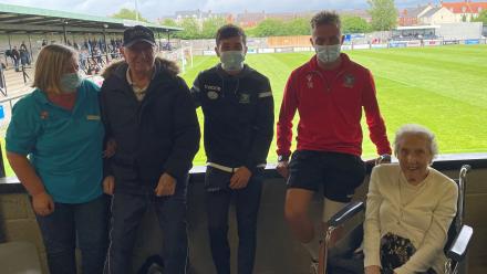 Staff and residents meet Salisbury FC players