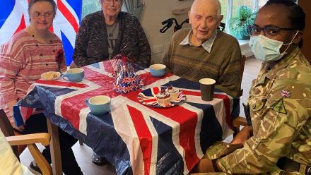residents with serving soldier from 19th Regiment RA