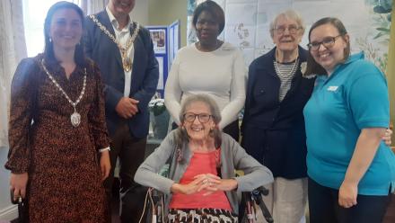 staff and residents meet the Mayor of Cheltenham at poetry book launch