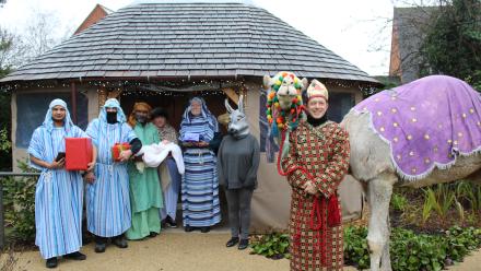 Residents and teams recreate the nativity along with real camel Kokoso