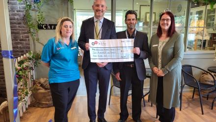 presentation cheque with L-R Sharon, Dan, Steve and Dan