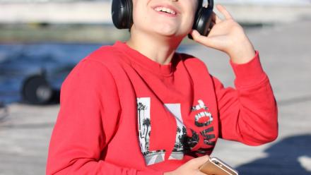 Boy listening to music with headphones