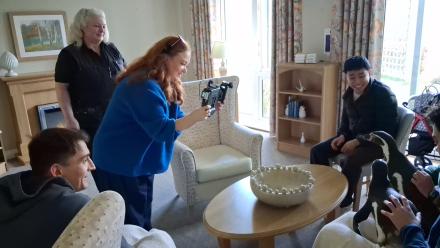 Two Special Humboldt Penguins Waddle Into The Lakes Care Centre for Unforgettable Resident Experience - With BBC Gloucestershire Capturing the Moment
